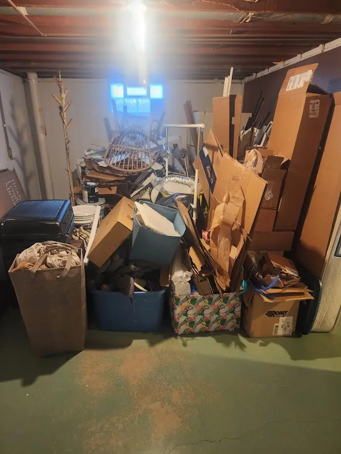 Roll-off dumpster container at job site for Roll Off Dumpster Rental in Libby